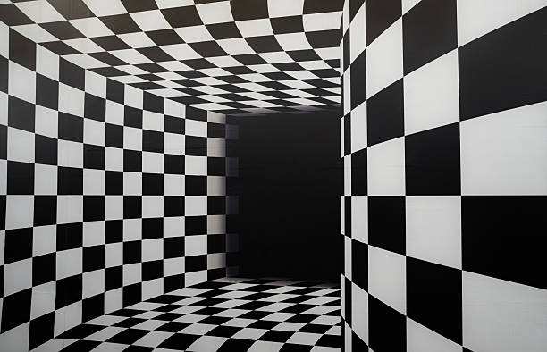 Abstract black and white checkered room creating strong optical illusion with geometric perspective, empty interior space designed for modern art background, creative studio use.