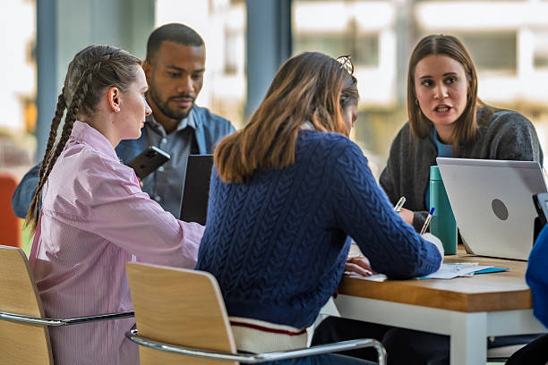 istock Diverse Colleagues Discuss in Modern Office Meeting Room 2256707492