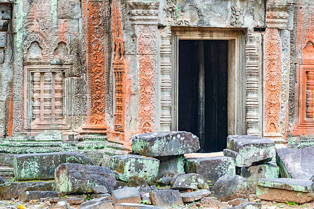 Ta Prohm Temple (popularly known as the Tomb Raider Temple) is a late-12th-century Khmer temple in the Angkor complex near Siem Reap, Cambodia, built under King Jayavarman VII as a Mahayana Buddhist monastery and university. Originally called Rajavihara, it was dedicated to the king’s mother and once housed thousands of monks, teachers, and attendants. Famous for massive silk-cotton and strangler fig trees growing over its ruins, Ta Prohm has been left largely unrestored to show the power of the jungle over stone.