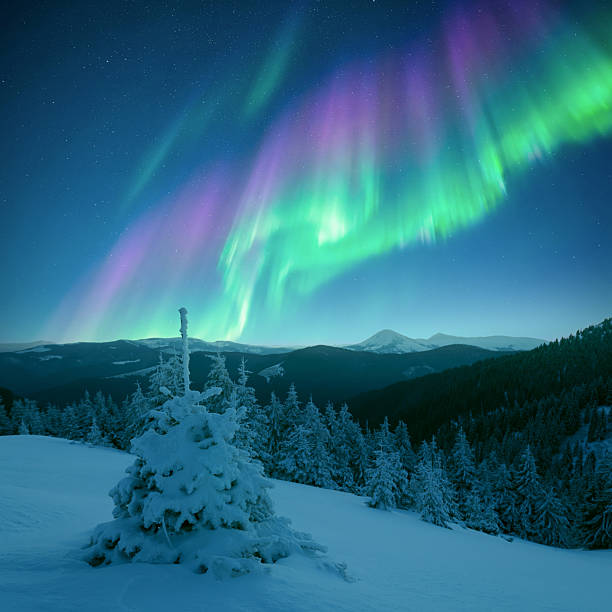 istock Incredible Northern lights in winter mountains 2256721474