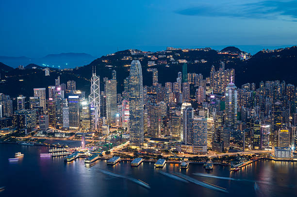 Hong Kong island skyline at the time of sunset, with Victoria Harbour