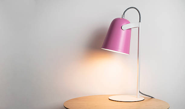 Yellow desk lamp on table