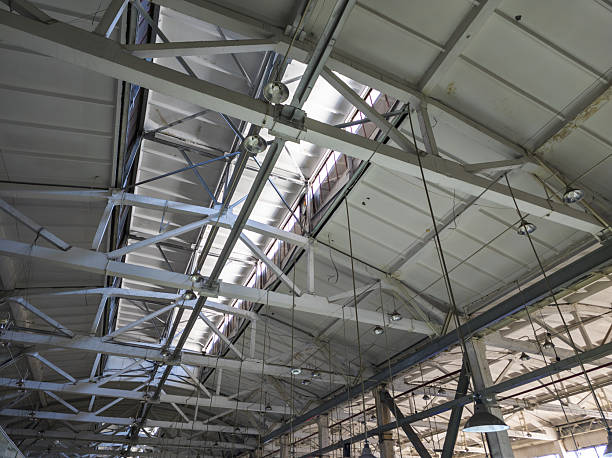 Industrial Building Ceiling with Concrete Roof Trusses, view from below