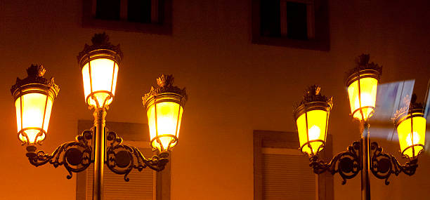 Retro style street lights. City street, Galicia, spain.