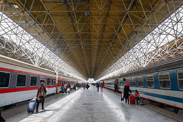 Passengers waiting on the platform of Tehran railway station