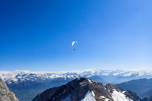 Pilatus, Switzerland: Paragliding in flight over the top