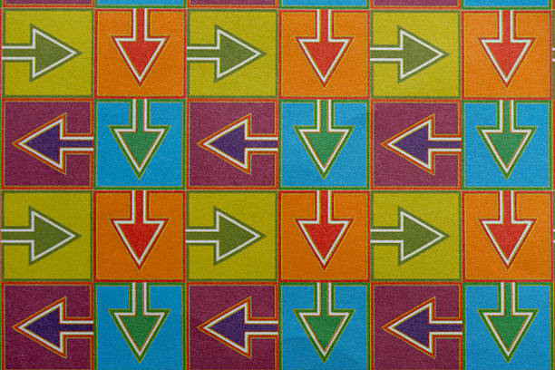 Abstract Pop Art Background with Repeated Arrow Icons in Multicolored Tiles
