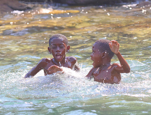 Boys frolicking in Nkata Bay, Malawi