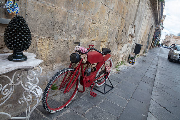 Coffee label on an old red bicycle