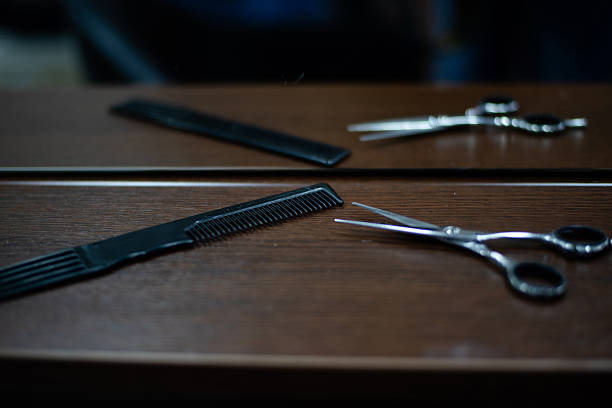Close-up view of hairdresser's tool on  wooden table