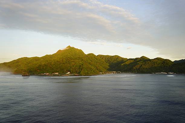 A wide angle photo looking out to the Pacific Ocean from the rocky coast of Pago Pago..