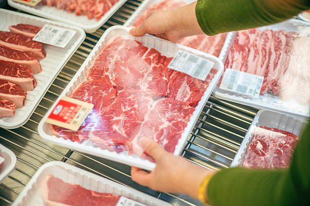 Sealed steaks in the supermarket freezer
