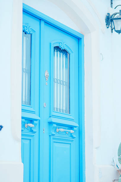 Greece, Naxos island, a blue painted door into home.