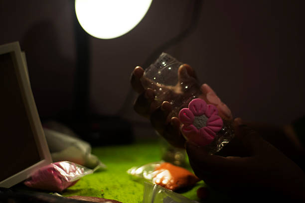 Art Project: Clay Flowers on Recycled Material
