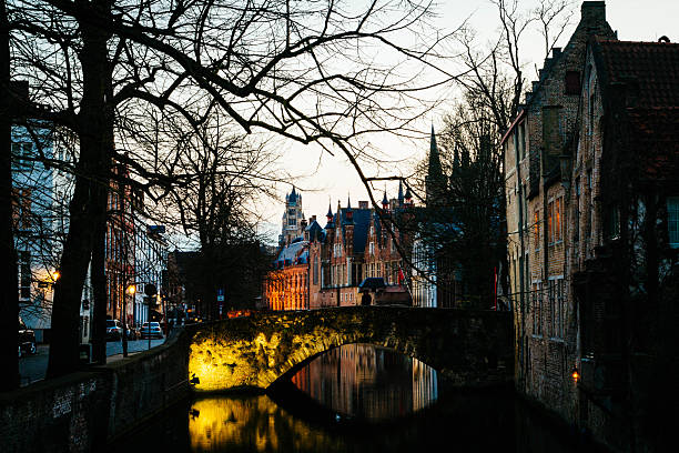 Street at Bruges canal at dawn