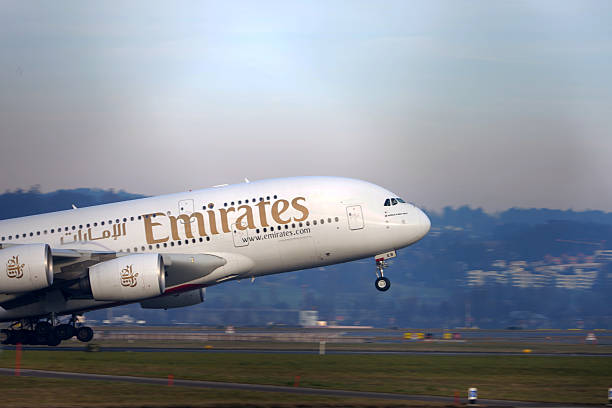 Emirates passenger airplane Airbus A380-800 registration A6-EEB taking off from Swiss Zürich Airport on a foggy winter day. Photo taken January 17th, 2026, Zurich, Switzerland.