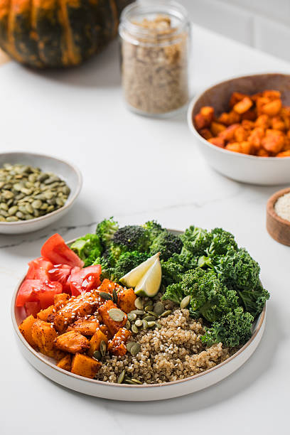 Healthy vegan buddha bowl with quinoa, pumpkin and vegetables. Vegetable recipes