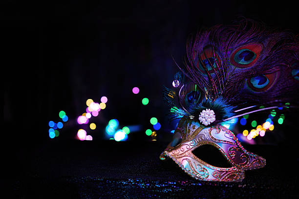istock Venetian carnival mask with peacock feathers celebrating mystery 2256900272