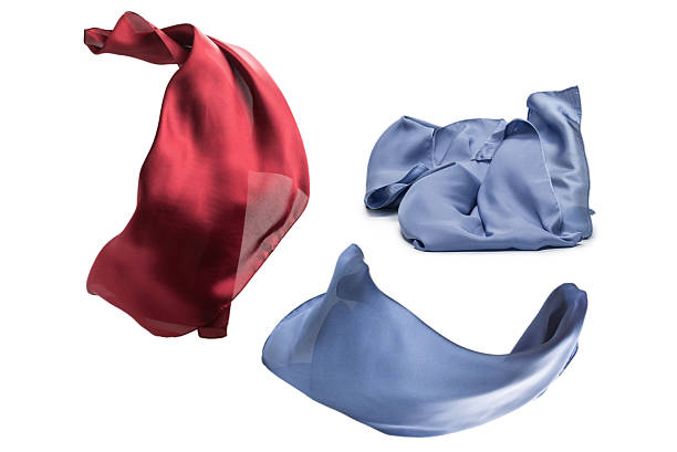 istock Flowing blue silk scarf isolated on white background. 2256902341