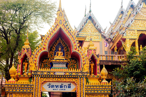 Buddha statue over entrance to Wat Laksi in Bangkok Laksi district located at Kamphengphet Road 6
