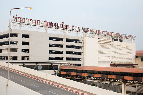 Don Muang Airport in Bangkok seen from BTS Skytrain station and footbridge