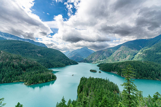 Diablo Lake, North Cascades National Park, is a reservoir famous for its vibrant, turquoise-blue water. This unique color is caused by \