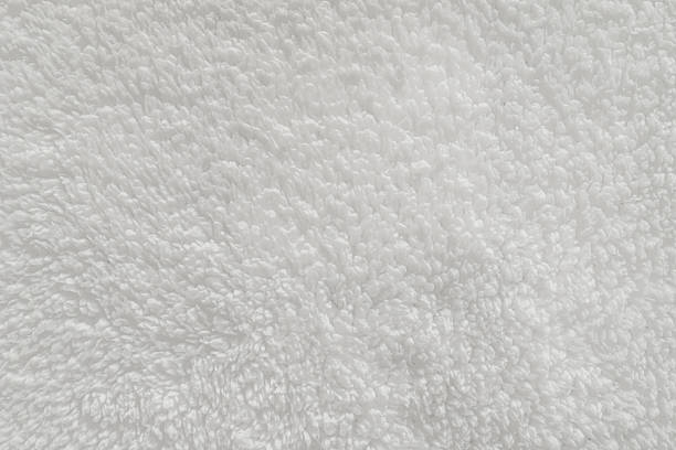 istock Soft white faux fur fabric texture close-up 2256921340