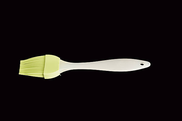 Silicone cooking brush isolated on black background