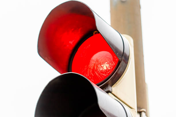 Red traffic light at night - turning back.
