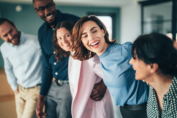 istock Cheerful team huddle in the office 2256933948