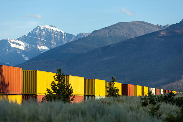 Train through the Bow Valley in Banff National Park in spring  with snow
