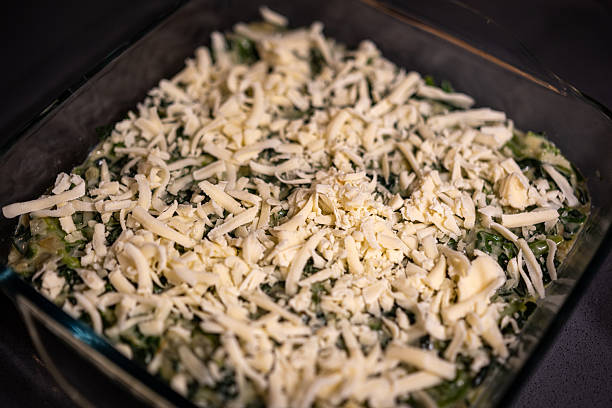 Spinach gratin with béchamel sauce in a gratin dish after baking in the oven  French cuisine