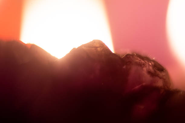 photograph of amethyst under candlelight