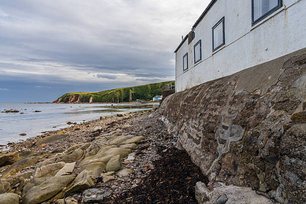 Burnmouth, Scottish Borders, Scotland, UK - September 11, 2023: Houses on the coast