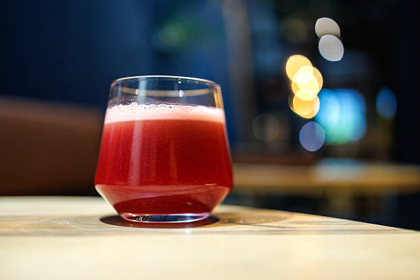 Fresh Beetroot Juice in Glass on Wooden Table Indoors