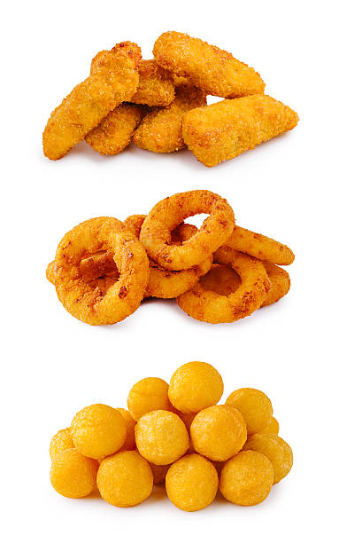 Variety of crispy fried snacks arranged in three layers for tasty enjoyment