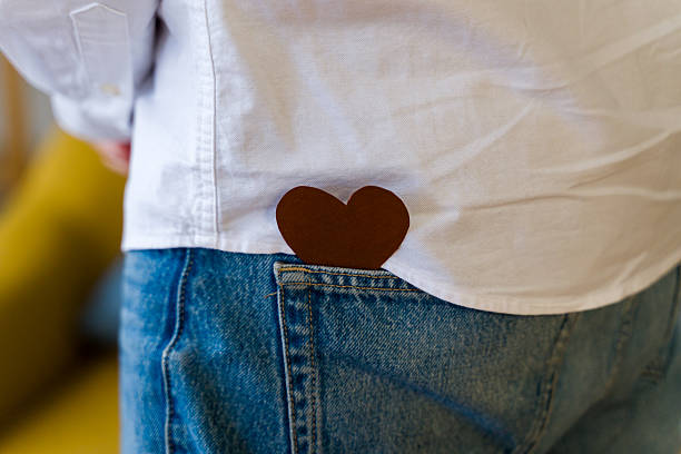 Heart shape in back pocket of jeans with white shirt