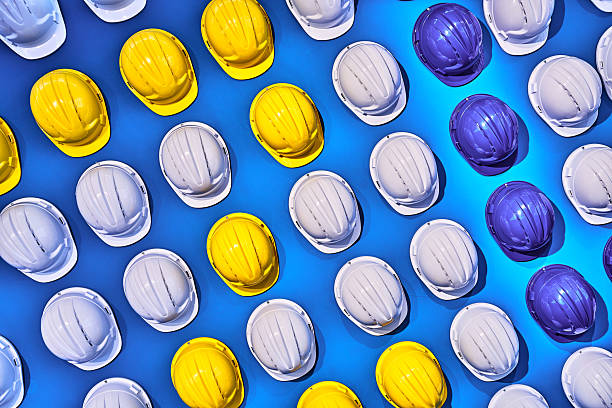 Safety helmets lined up on the wall