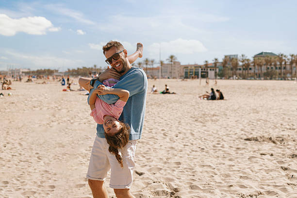 Father daughter bonding during sunny vacation