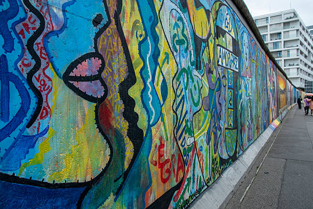 View of the murals painted on part of the Berlin Wall.After the German reunification, artists have turned this former stretch of the Berlin Wall into the largest open-air gallery in the world.