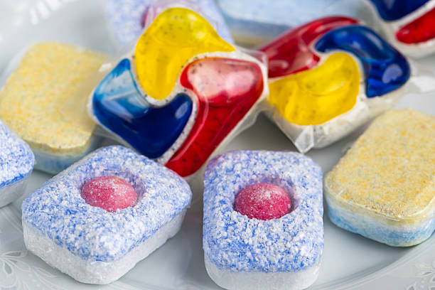 A large collection of colorful dishwashing pods displayed together. Perfect for themes of cleaning products, household chores, and home essentials.