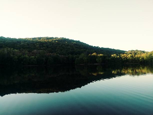 A sunny evening at a small lake at the bottom of the mountain.