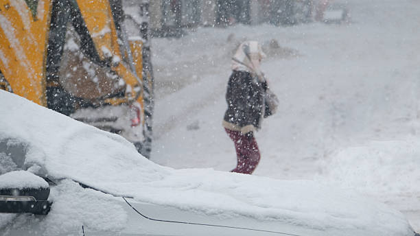 istock Woman is unrecognizable in heavy snowfall 2257071165