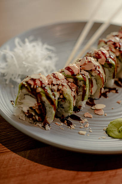 Japanese Sushi Rolls with Pickled Ginger and Wasabi on Plate