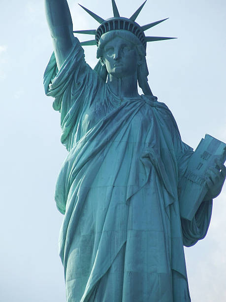 Up close and personal with the Statue of Liberty from a sightseeing river cruise. New York and New Jersey, 2009