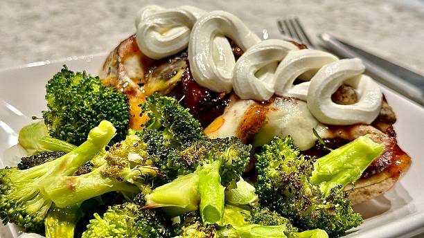 BBQ rib loaded baked potato with chargrilled broccoli.