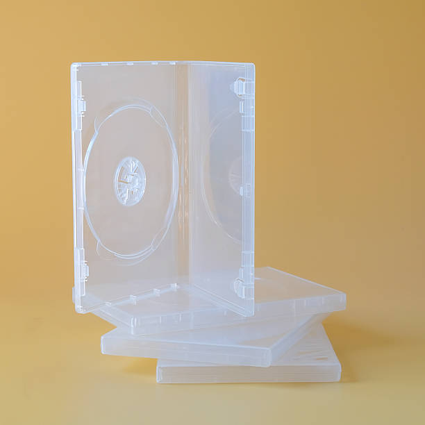 Blank CD case or CD cover on color background.
