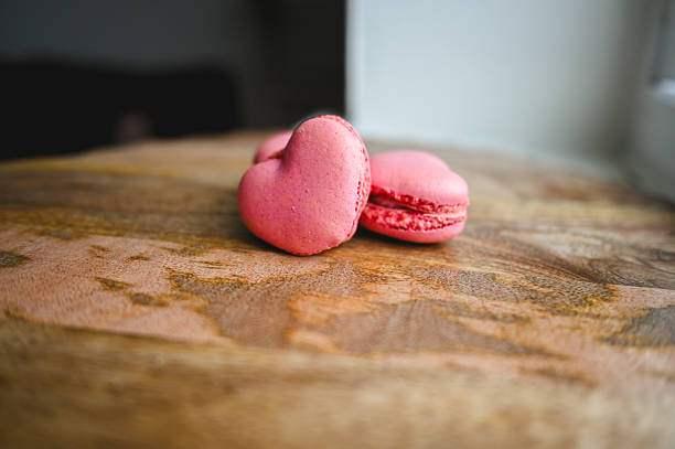 Heart shaped pink macarons for Valentine's Day