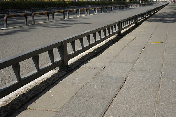 City Infrastructure: Road, Fence, and Sidewalk in Clean Design