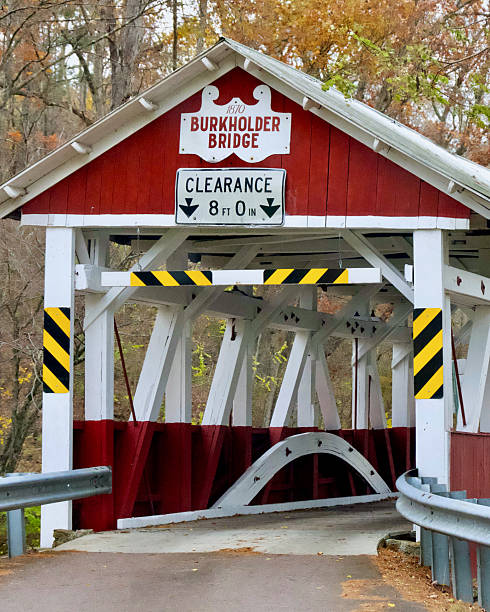 Garrett, Pennsylvania, USA - October 19, 2025: The historic Burkholder Bridge crosses Buffalo Creek in Somerset County in Southwest Pennsylvania.